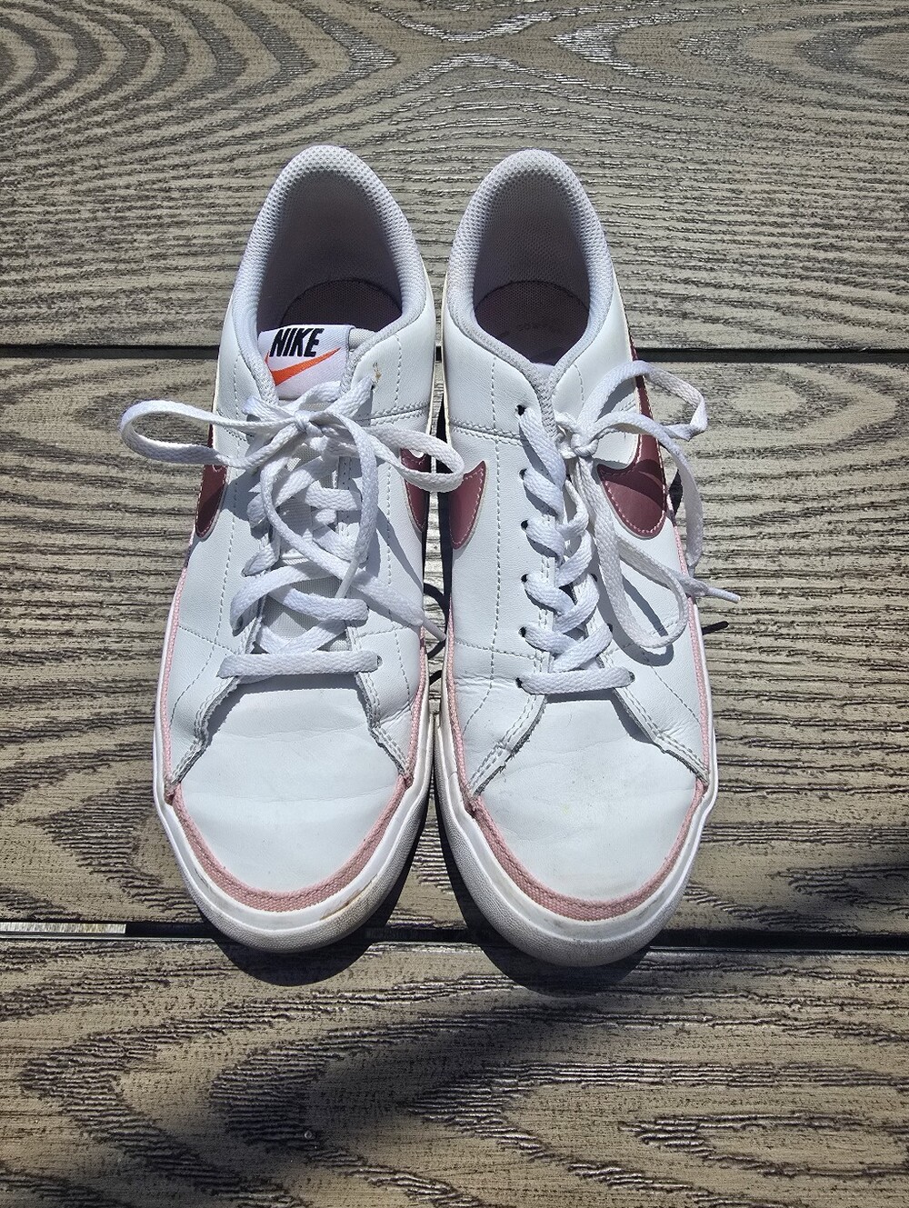 Nike Women’s White Sneakers with Pink Swoosh and Trim